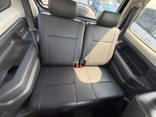 2010 Suzuki Jimny Kei car III Рестайлинг 1, чёрный, 610000 рублей, вид 4
