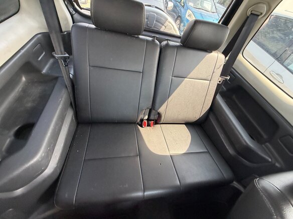 2010 Suzuki Jimny Kei car III Рестайлинг 1, чёрный - вид 3