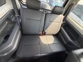 2010 Suzuki Jimny Kei car III Рестайлинг 1, чёрный - вид 3