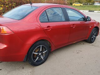2007 Mitsubishi Lancer X, красный, 490000 рублей, вид 4