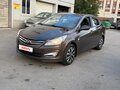 2016 Hyundai Solaris I Рестайлинг, коричневый, 820000 рублей - вид 3