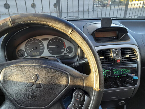 2003 Mitsubishi Carisma I Рестайлинг, серый - вид 1