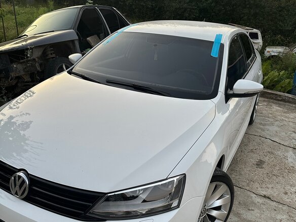 2015 Volkswagen Jetta VI Рестайлинг, белый, 845000 рублей - вид 1