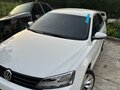 2015 Volkswagen Jetta VI Рестайлинг, белый, 845000 рублей - вид 1