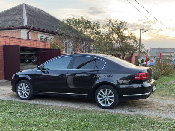 2012 Volkswagen Passat B7, чёрный, 1280000 рублей - вид 1
