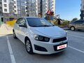 2013 Chevrolet Aveo II, белый, 700000 рублей - вид 2