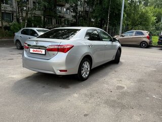 2014 Toyota Corolla XI (E160, E170, E180), серебристый, 1275000 рублей, вид 3