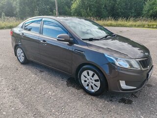 2015 Kia Rio 6-speed III, коричневый, 879000 рублей, вид 2