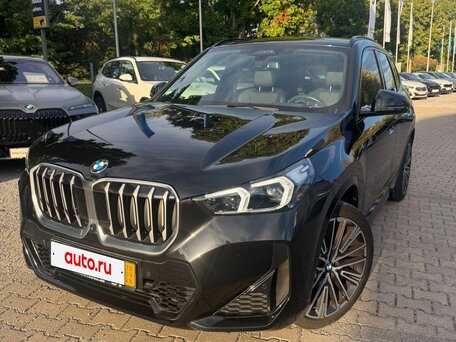 2023 BMW X1 18i sDrive III (U11/U12), чёрный, вид 1