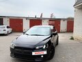 2008 Mitsubishi Lancer X, чёрный, 730000 рублей - вид 1