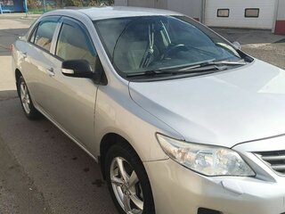 2010 Toyota Corolla X (E140, E150), серебристый, 920000 рублей, вид 2