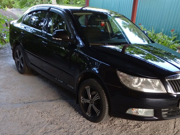 2011 Skoda Octavia II (A5) Рестайлинг, чёрный, 810000 рублей - вид 2
