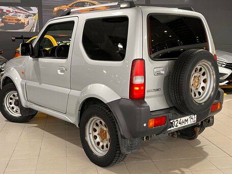 2012 Suzuki Jimny III Рестайлинг 1, серебристый, 890000 рублей, вид 4