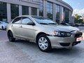 2007 Mitsubishi Lancer X, бежевый, 330000 рублей - вид 2