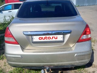2010 Nissan Tiida I Рестайлинг, коричневый, 640000 рублей, вид 4