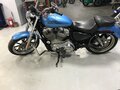 2011 Harley-Davidson Sportster 883, синий - вид 1