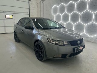 2012 Kia Cerato 6-speed II, серебристый, 950000 рублей, вид 3