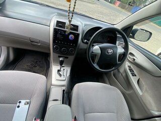 2009 Toyota Corolla Axio X (E140, E150) Рестайлинг, серебристый, 750000 рублей, вид 4