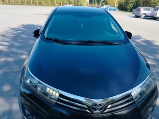 2013 Toyota Corolla XI (E160, E170, E180), чёрный, 1350000 рублей, вид 1