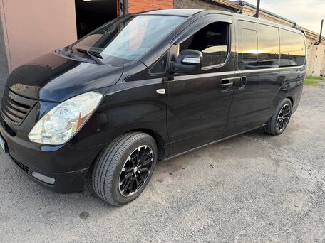 2010 Hyundai Grand Starex I, чёрный, вид 2