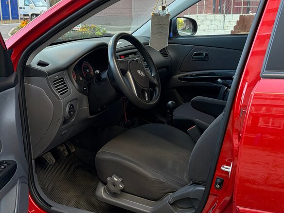 2011 Kia Rio II Рестайлинг, красный - вид 3