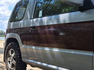 2009 Mitsubishi Pajero Mini II, серый, 852000 рублей, вид 2