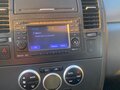 2011 Nissan Tiida I, белый, 650000 рублей - вид 9