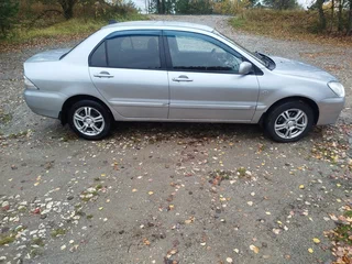 2005 Mitsubishi Lancer IX, серебристый, 430000 рублей, вид 3