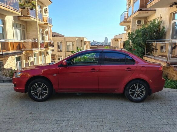 2008 Mitsubishi Lancer X, красный, 790000 рублей - вид 7