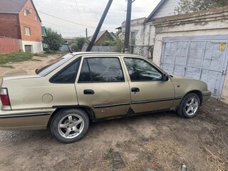 2007 Daewoo Nexia I, коричневый, 115000 рублей, вид 2