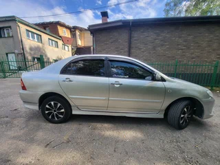 2005 Toyota Corolla IX (E120, E130) Рестайлинг, серый, 490000 рублей, вид 4