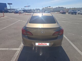 2014 Opel Astra J Рестайлинг, золотистый, 990000 рублей, вид 4
