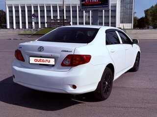 2010 Toyota Corolla X (E140, E150), белый, 955000 рублей, вид 5