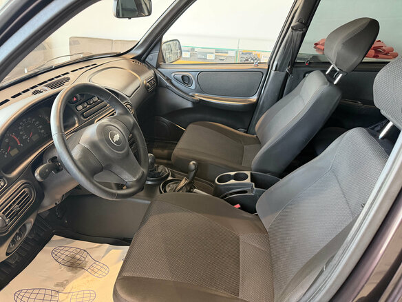 2010 Chevrolet Niva I Рестайлинг, коричневый, 420000 рублей - вид 6