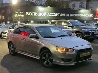 2008 Mitsubishi Lancer X, золотистый, 599000 рублей, вид 2