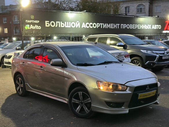 2008 Mitsubishi Lancer X, золотистый - вид 1