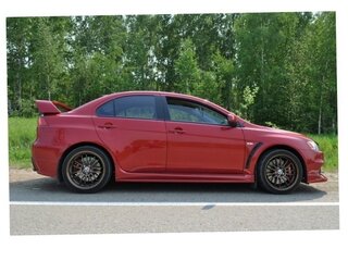 2008 Mitsubishi Lancer Evolution X, красный, 5250000 рублей, вид 1