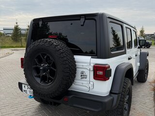 2024 Jeep Wrangler 4xe IV (JL) Рестайлинг, белый, 7000000 рублей, вид 4