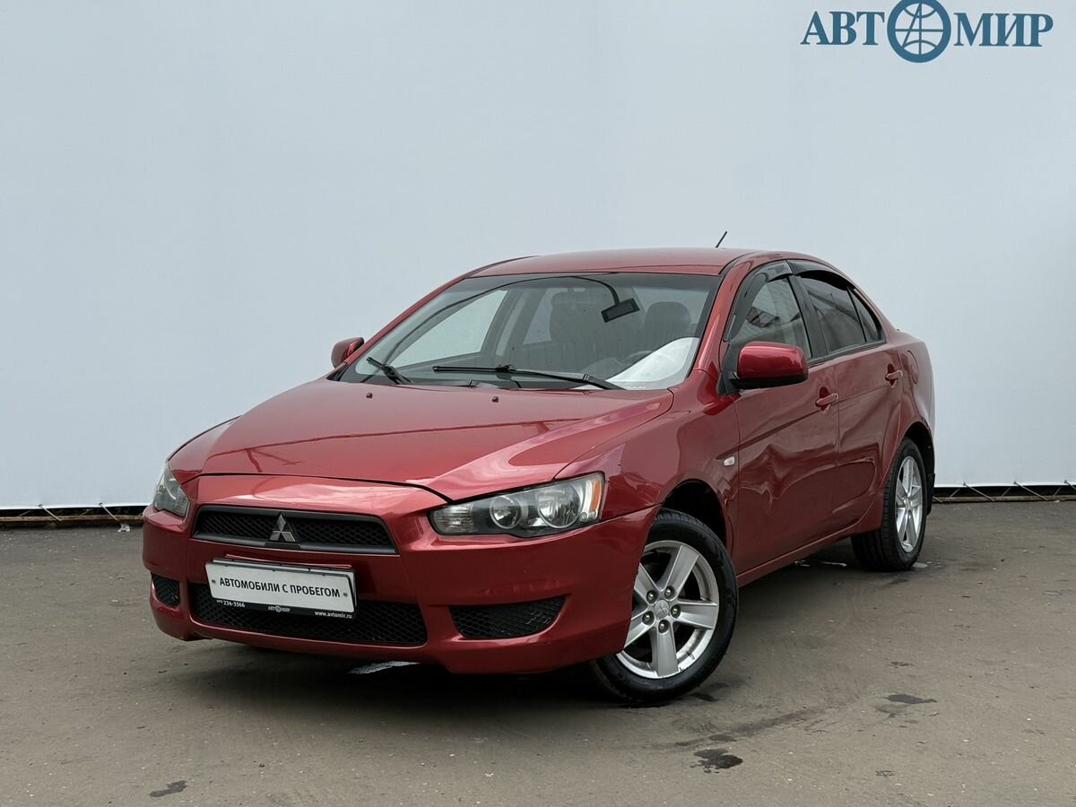 Открыть фотографии: Mitsubishi Lancer X