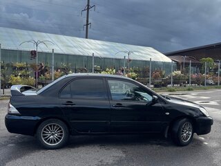 2009 Mitsubishi Lancer Classic IX Рестайлинг, чёрный, 330000 рублей, вид 5