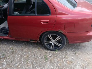1996 Nissan Almera I (N15), пурпурный, 250000 рублей, вид 3