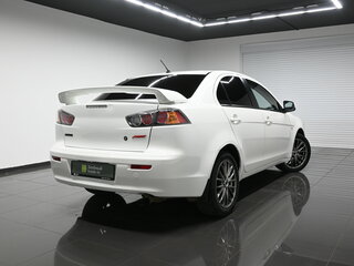 2012 Mitsubishi Lancer X Рестайлинг, белый, 860000 рублей, вид 2