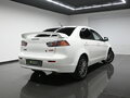 2012 Mitsubishi Lancer X Рестайлинг, белый, 860000 рублей - вид 1
