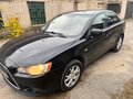 2012 Mitsubishi Lancer X Рестайлинг, чёрный, 520000 рублей