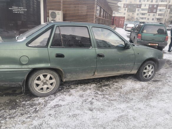 2004 Daewoo Nexia I, зелёный - вид 1