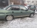 2004 Daewoo Nexia I, зелёный - вид 1