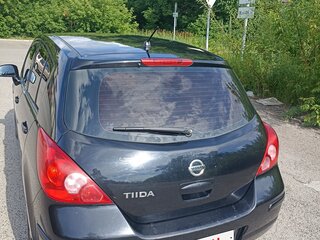 2011 Nissan Tiida I Рестайлинг, чёрный, 700000 рублей, вид 4