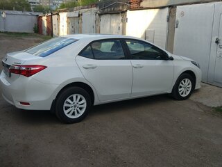 2015 Toyota Corolla XI (E160, E170, E180), белый, 1999000 рублей, вид 3