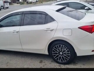 2014 Toyota Corolla XI (E160, E170, E180), белый, 1450000 рублей, вид 5