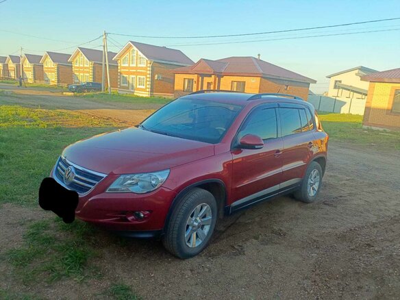 2011 Volkswagen Tiguan I, красный, 1600000 рублей